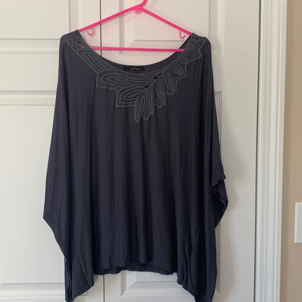 Slate gray/blue “winged” top.